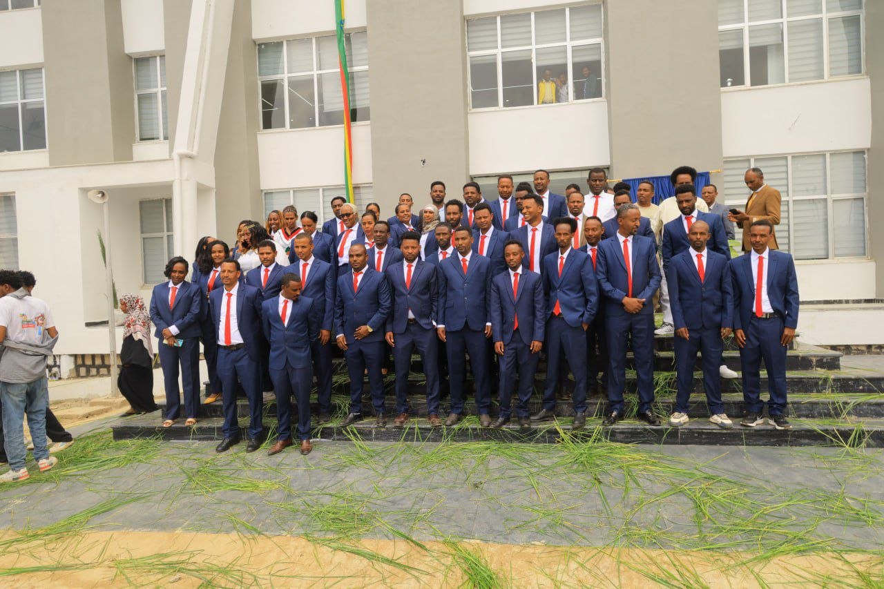 A staff group gathered in front of Burayu Mesob.
