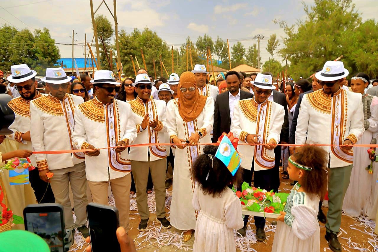 Officials and guests take part in the opening ceremony.