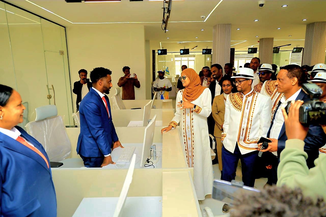 Officials tour the service counters.